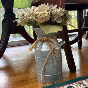 Farmhouse Style Galvanized Milk Can with green, white & tan flower arrangement.